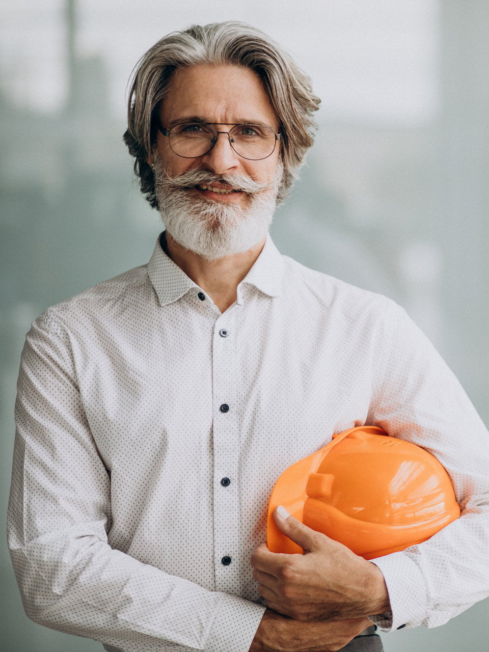 Middle aged business man in a hard hat